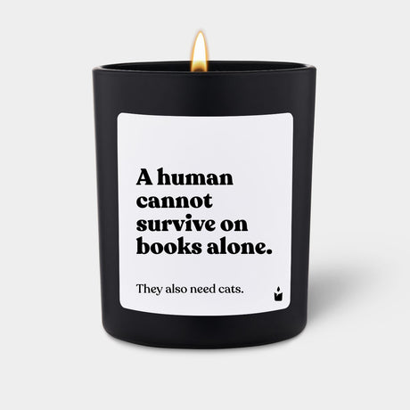 Duftkerze Schwarz Woody A human cannot survive on books alone. They also need cats. von ChattyCandles