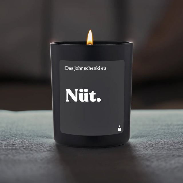 Duftkerze Schwarz Woody Das johr schenki eu Nüt.